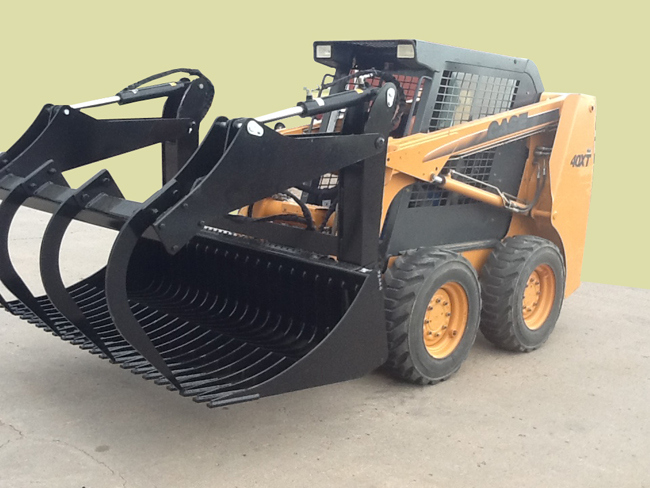 Bale Grapple Mounted On Skid Steer Loader With Grapple Closed