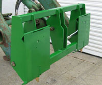 Adapter Plate Mounts on John Deere 48 And 58 Series Tractor Loaders, Allows Attachment Of Skid Steer Attachments